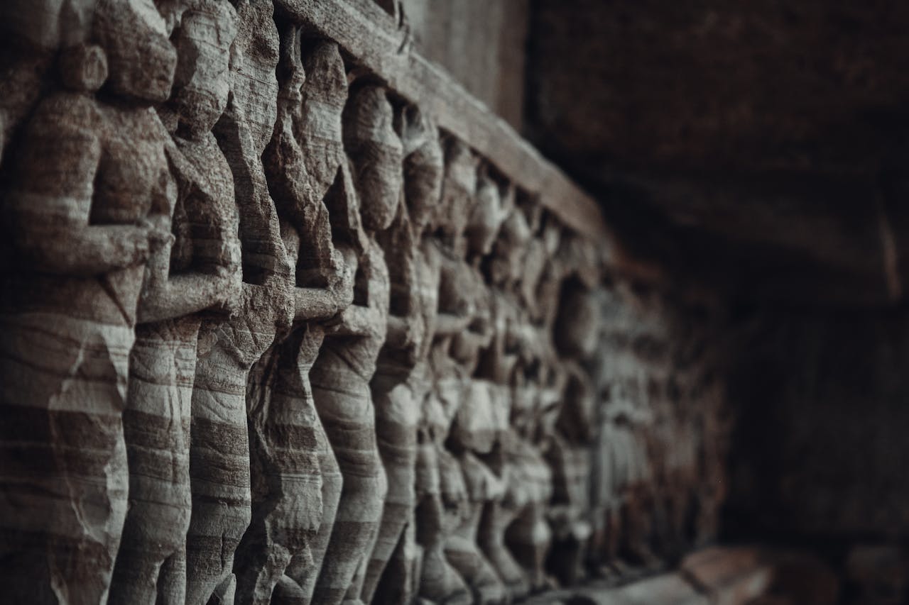 Intricate ancient stone carvings and sculptures at Chittorgarh Fort, India, showcasing remarkable craftsmanship.